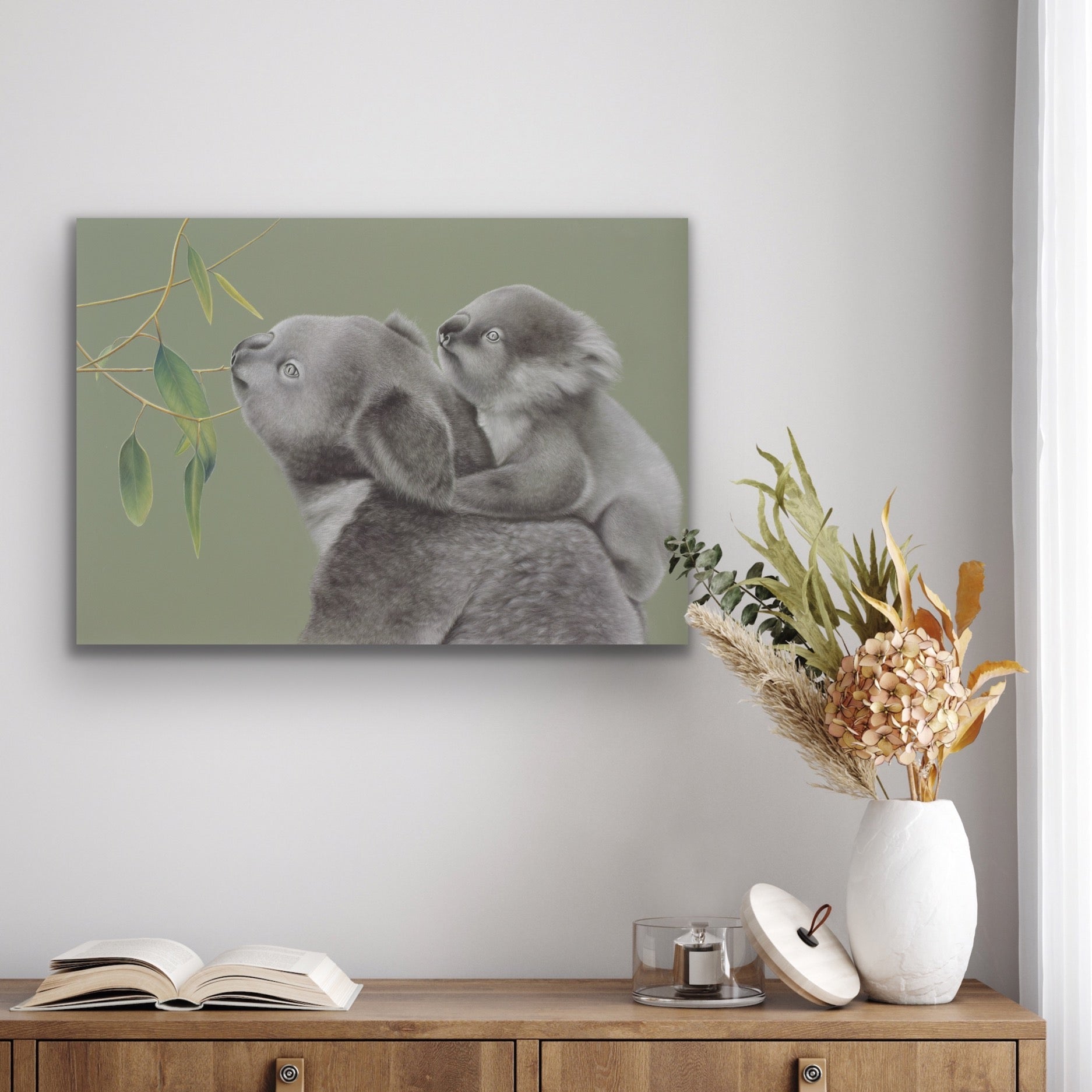 piggy back stretched canvas print hanging on wall