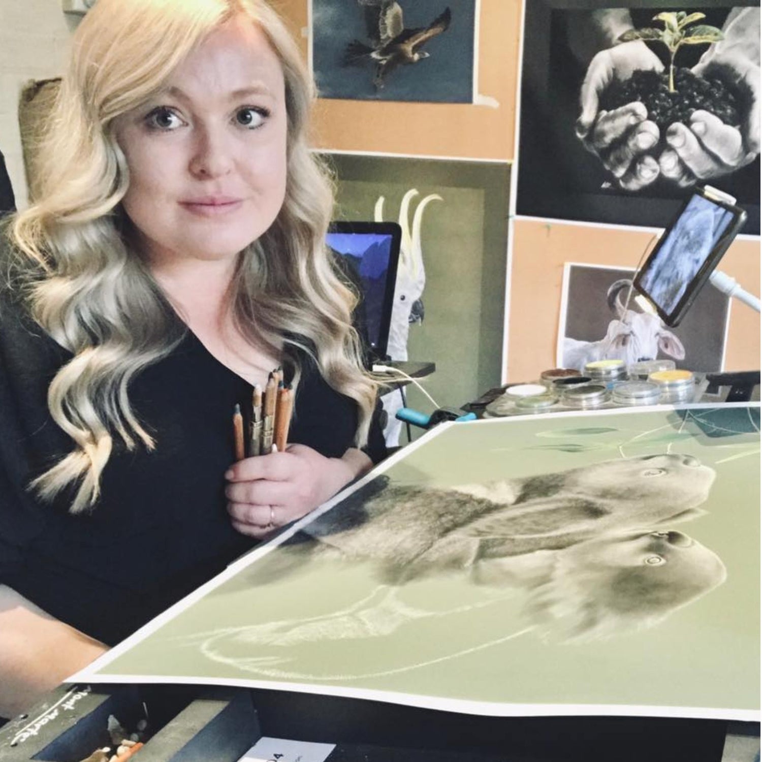 Artist Kay Davidson at her art easel