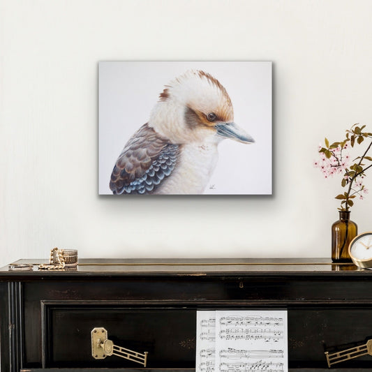Kookaburra king stretched canvas print hanging on wall over side table